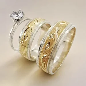 Set de anillo de compromiso y argollas de matrimonio minimalistas